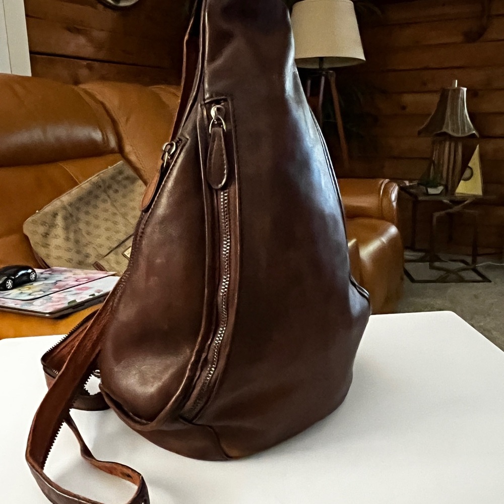 Classic Tobacco Brown Leather Sling Backpack - Women's 12” x 11”.